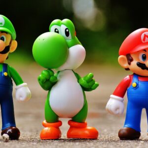 Focus Photo of Super Mario, Luigi, and Yoshi Figurines